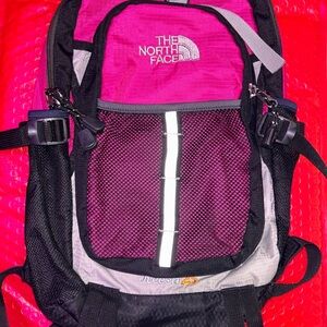 The North Face Magenta and Black Backpack